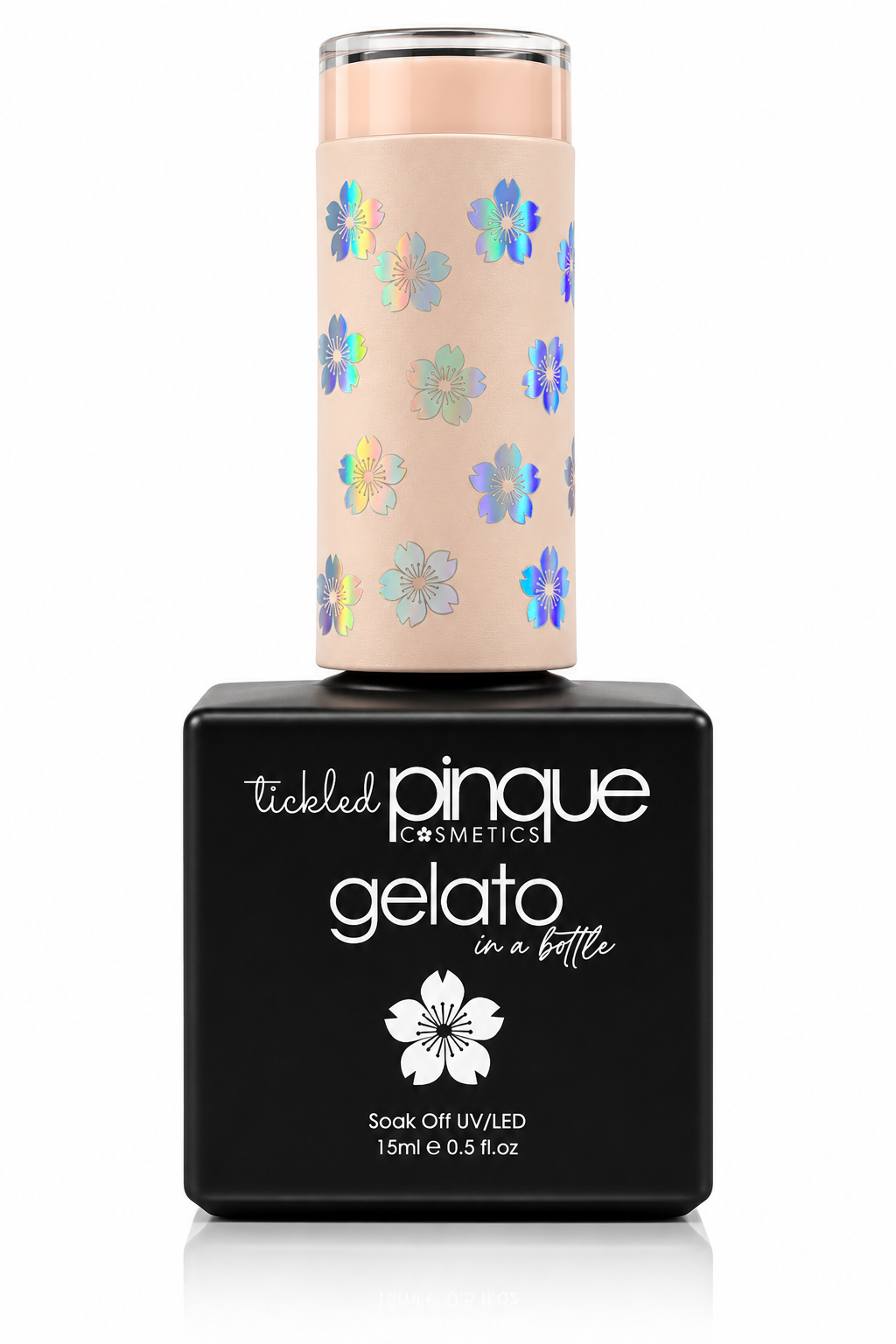 Tickled Pinque Cosmetics Gelato in a Bottle nail polish, featuring a black rectangular bottle with a beige cylindrical cap decorated with iridescent holographic flowers, on a white background.