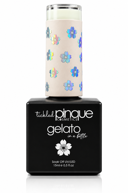 Tickled Pinque Cosmetics Gelato soak gel in a bottle, featuring a black rectangular bottle with a beige cylindrical cap decorated with iridescent blue and purple flowers.